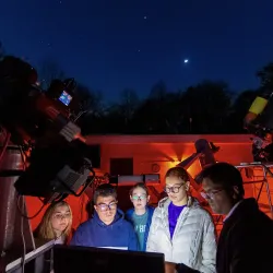 Students looking into observatory 